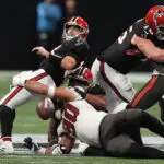 Cousins throws for 509 yards, hits Hodge in OT to give Falcons 36-30 win over Bucs