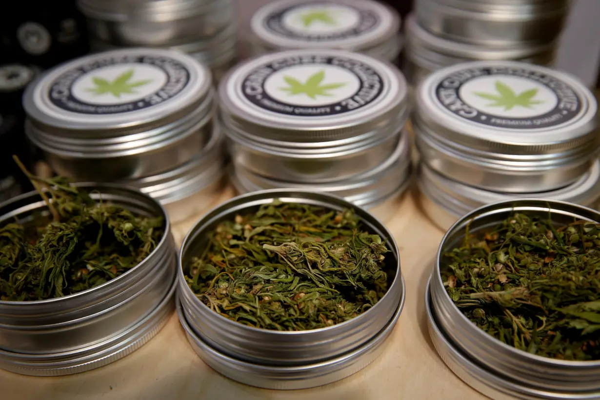 Cans with cannabis buds are seen at the Balkannabis Expo 2018, in Athens