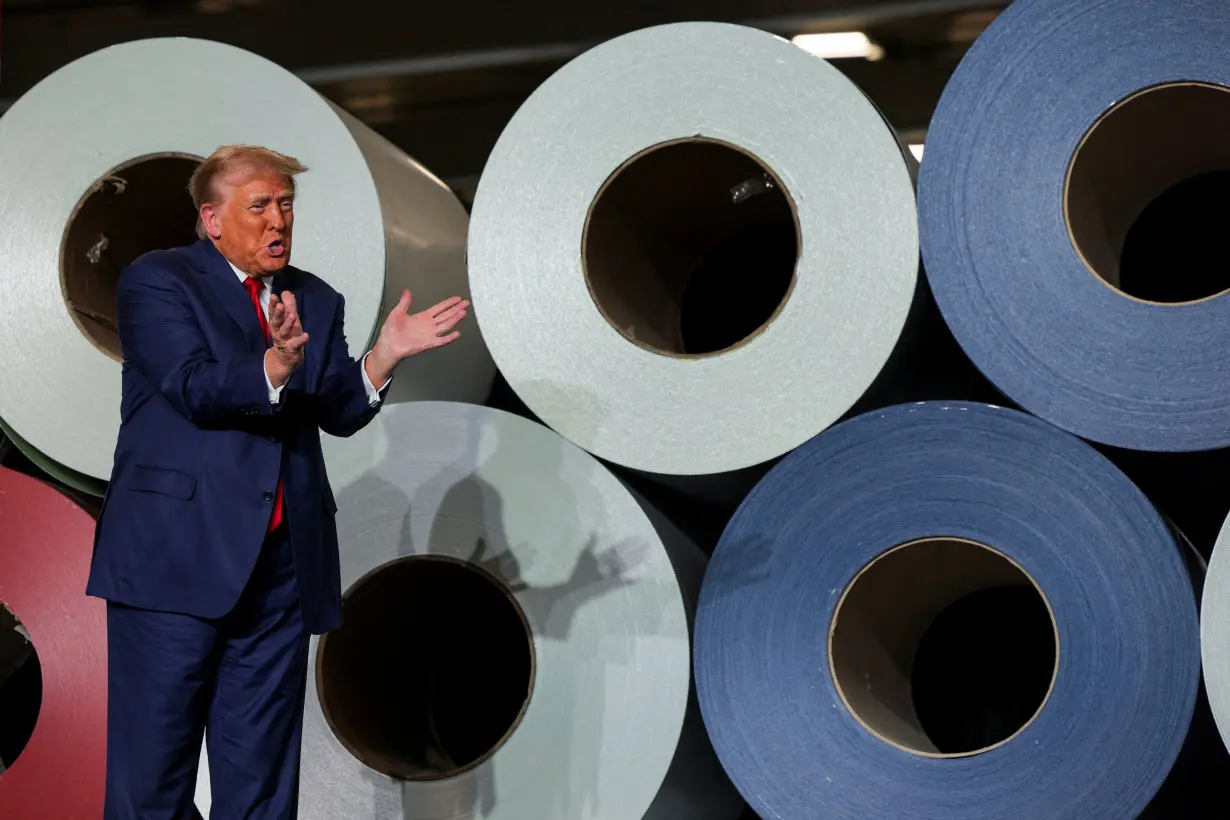 FILE PHOTO: Republican presidential nominee and former U.S. President Donald Trump visits manufacturer FALK Production in Walker