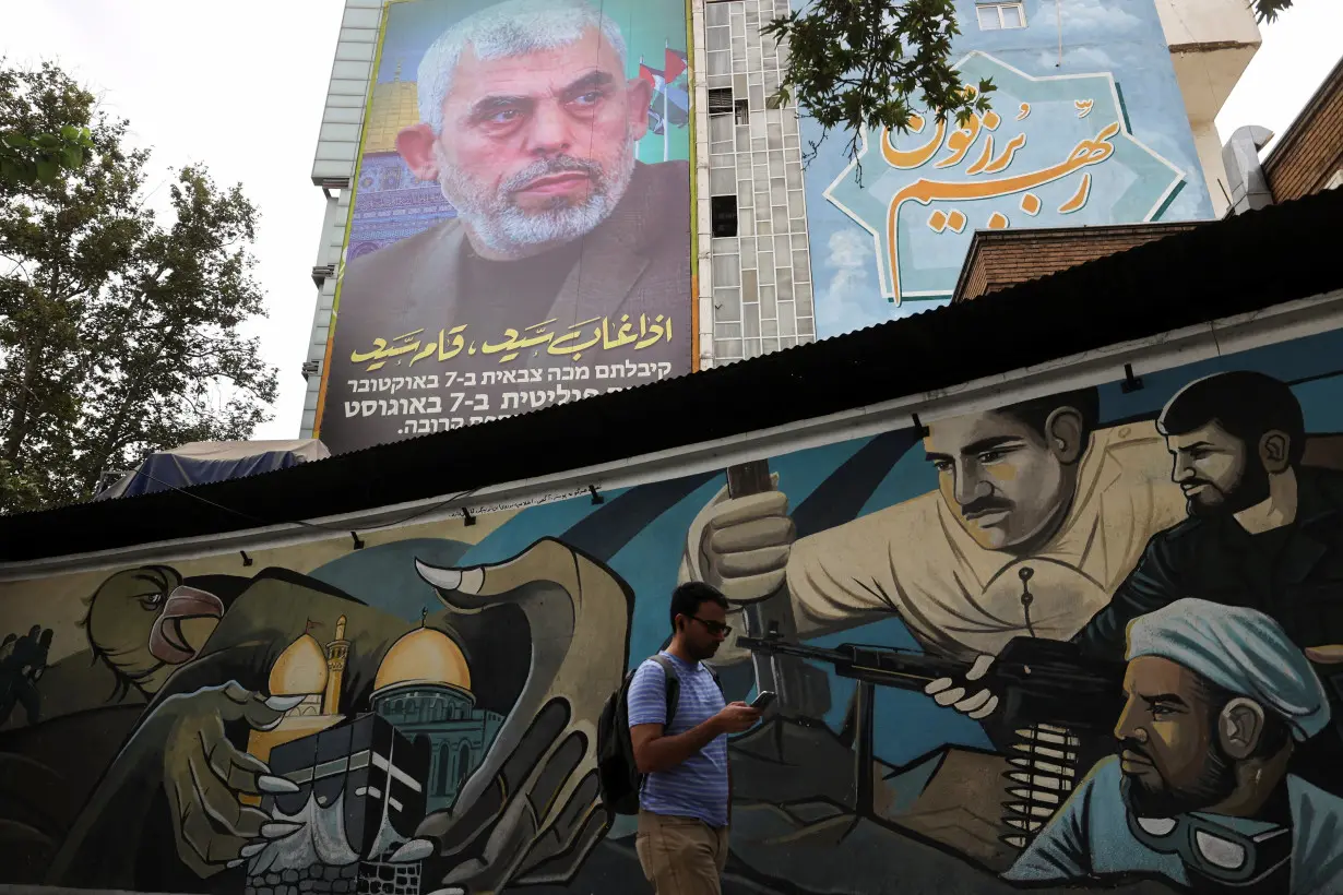 A billboard with a picture of newly appointed Hamas leader Yahya Sinwar is displayed in Tehran