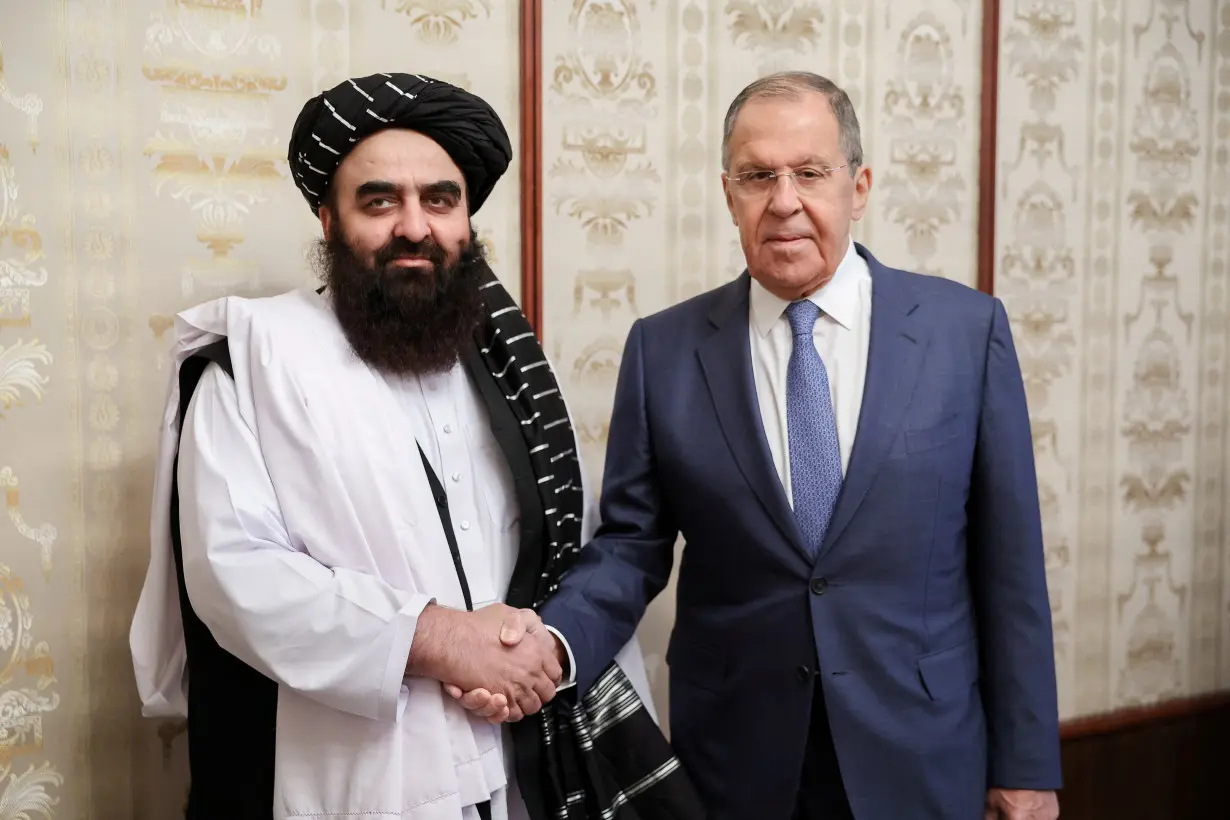 FILE PHOTO: Russian Foreign Minister Sergei Lavrov meets Taliban's Acting Foreign Minister Amir Khan Muttaqi in Moscow