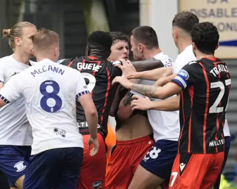 Soccer player in England's second division suspended for biting opponent during ill-tempered game