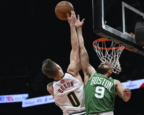 Celtics beat the Nuggets 107-103 in the NBA's preseason opener at Abu Dhabi