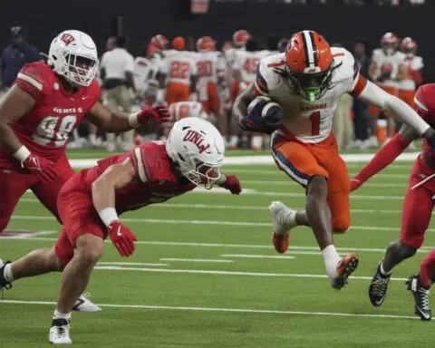 Syracuse rallies to force overtime and beat No. 25 UNLV 44-41, spoiling Rebels' poll debut