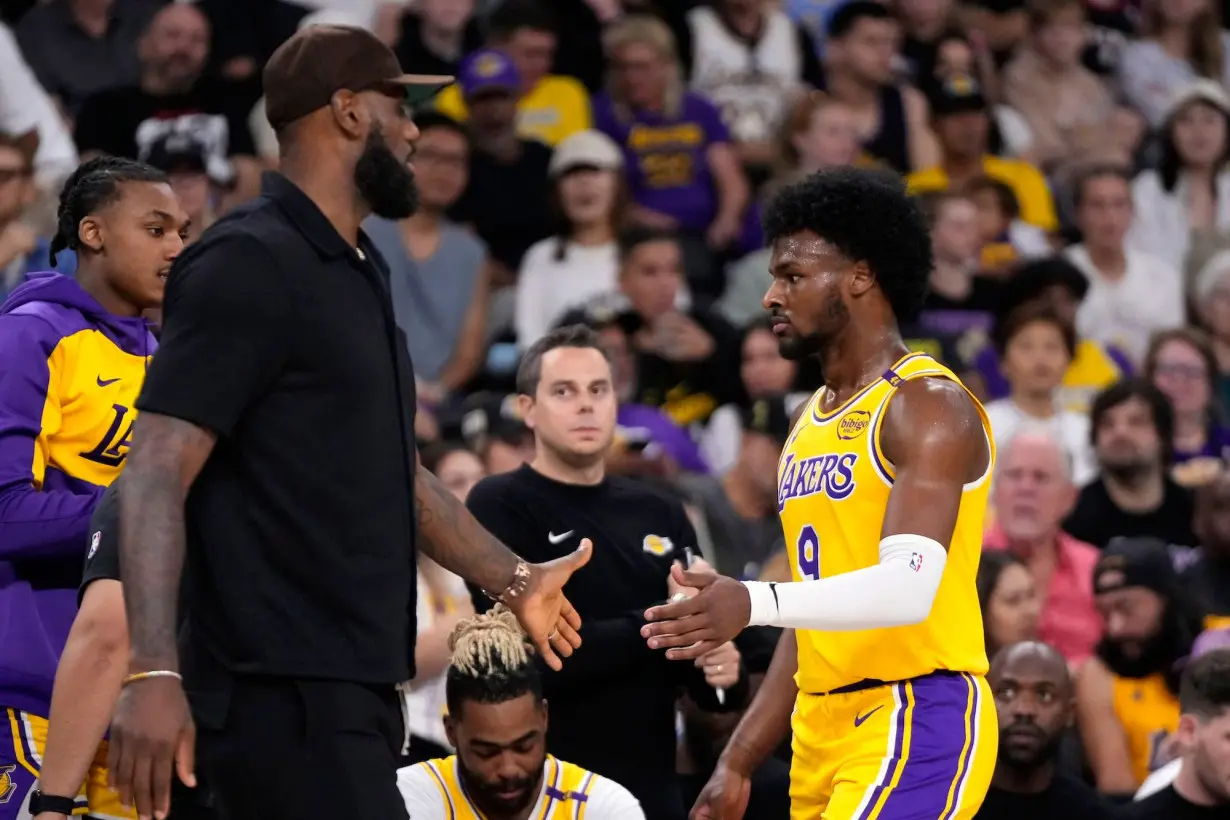 LeBron James cut a restrained figure for much of the game while watching his son, Bronny.