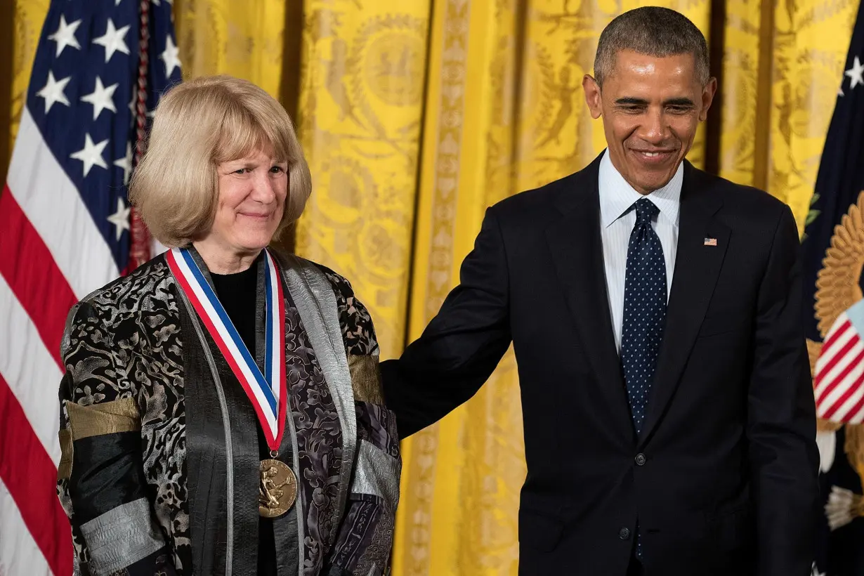 Mary-Claire King of the University of Washington School of Medicine appears with President Barack Obama after receiving the National Medal of Science in a White House ceremony in May 2016.