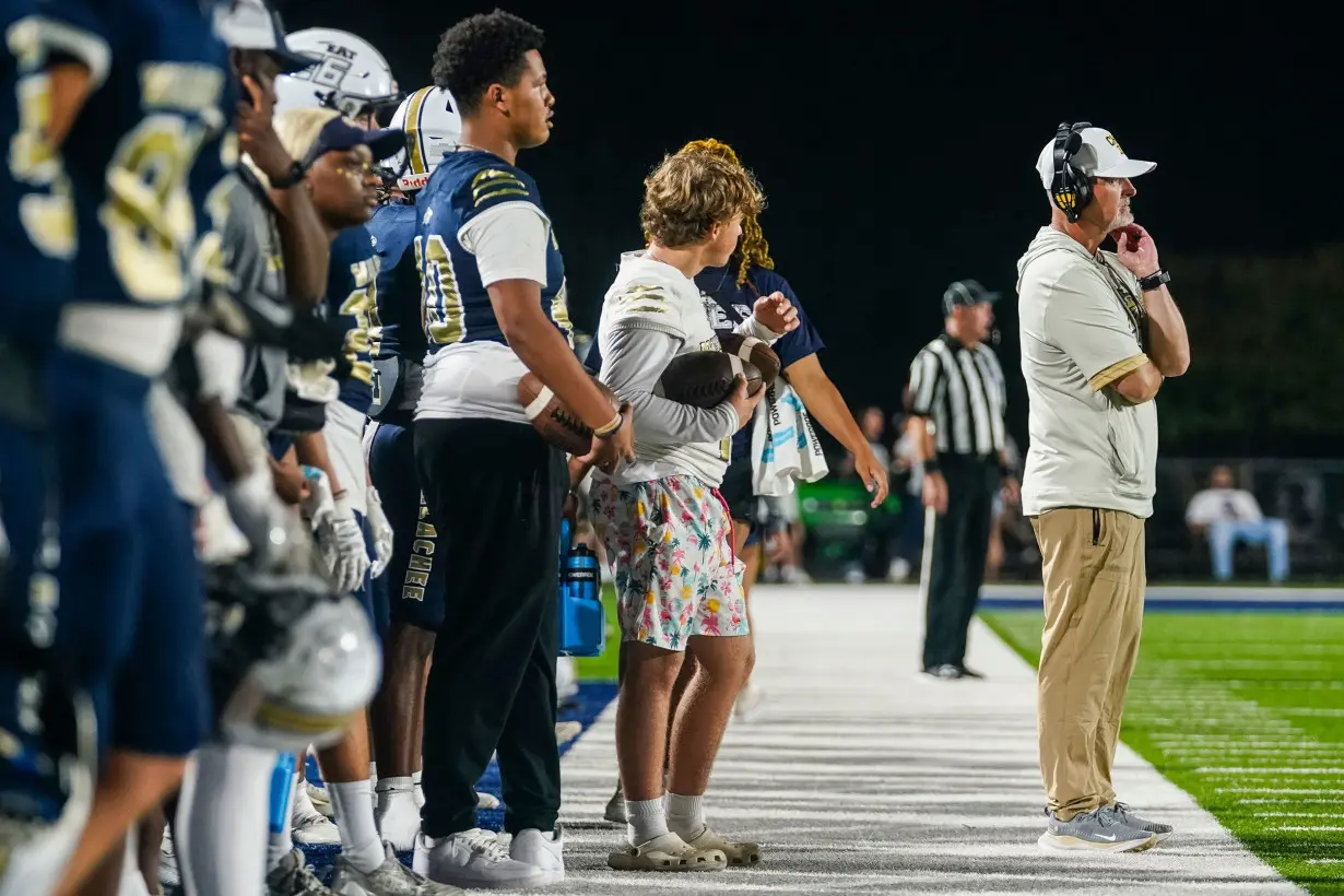 Head football coach Mike Hancock is seen on the sidelines during Friday's game.