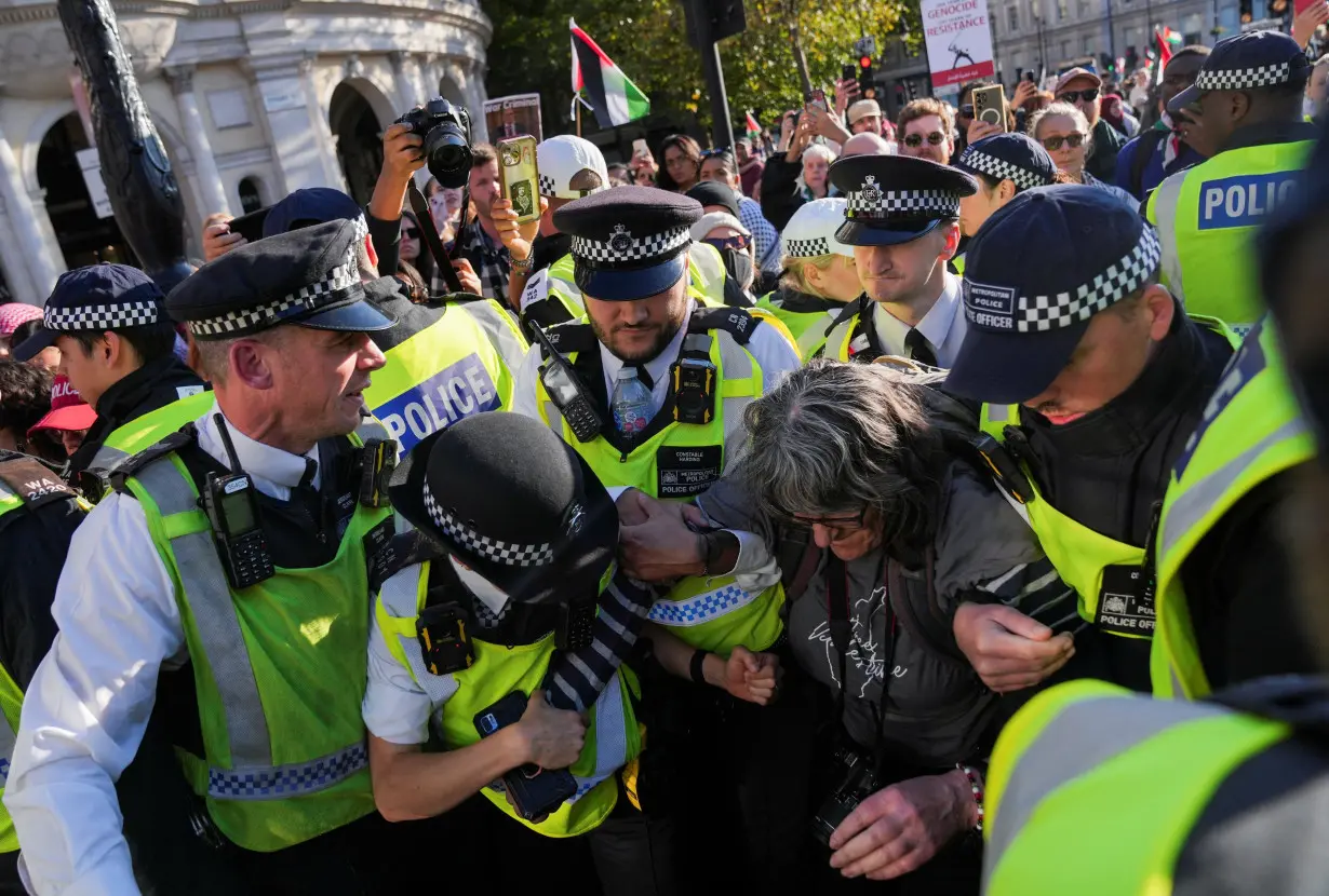 People demonstrate in support of Palestinians in Gaza, in London