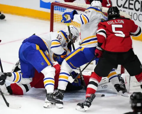 Cotter scores as Devils beat Sabres 3-1 to sweep season-opening series in Prague