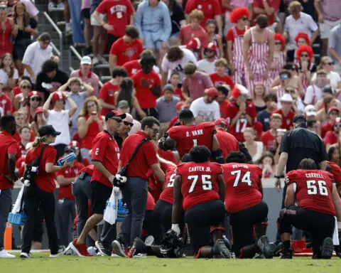 NC State QB McCall is 'alert and in good spirits' following a helmet-jarring hit