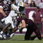 Moss scores 3 TDs as No. 25 Texas A&M gives No. 9 Missouri its first loss in 41-10 rout