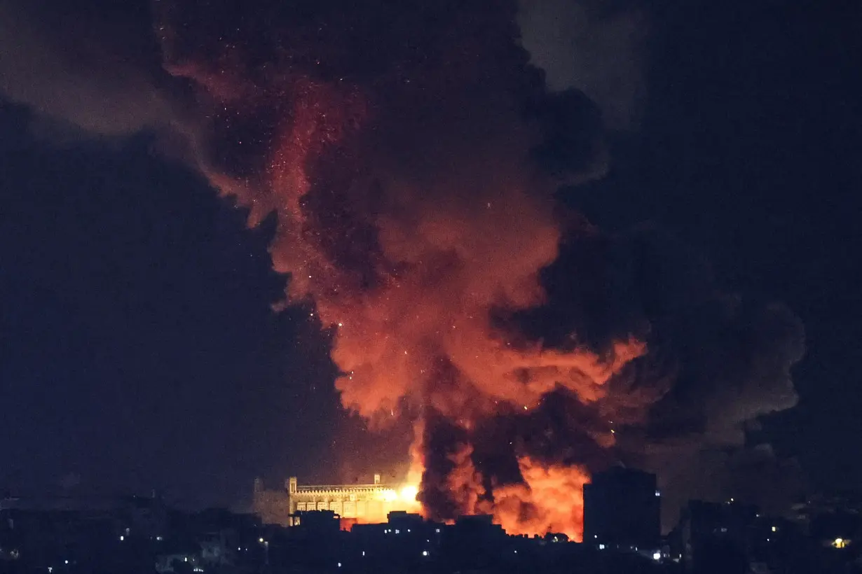 Smoke billows over Beirut's southern suburbs after a strike, amid ongoing hostilities between Hezbollah and Israeli forces