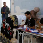 Tunisians vote in election, with main rival to President Saied in prison