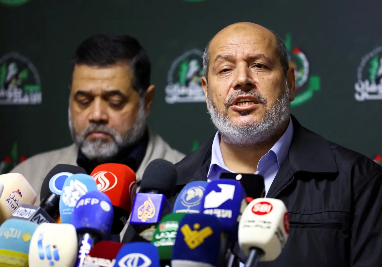 FILE PHOTO: Hamas's officials, Khalil Al-Hayya and Osama Hamdan hold a press conference in Beirut