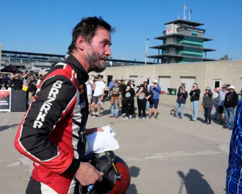 Keanu Reeves makes professional auto racing debut at Indianapolis Motor Speedway