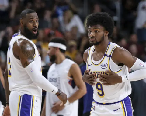 LeBron and son Bronny James play together for the first time in a preseason game for the Lakers