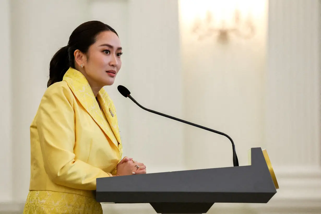 FILE PHOTO: Thailand's Prime Minister Paetongtarn Shinawatra and her cabinet members attend a press conference in Bangkok