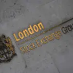 FTSE 100 opens slightly higher; precious metal miners cap gains