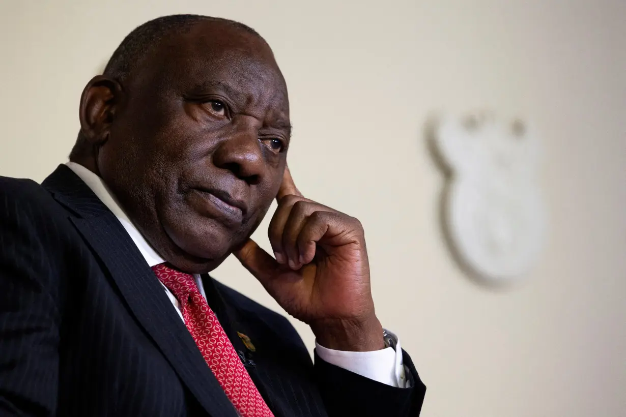 FILE PHOTO: South Africa's President Cyril Ramaphosa attends a media briefing at the Union Building in Pretoria