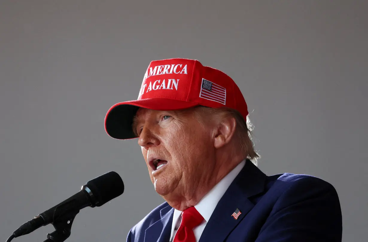 FILE PHOTO: Republican presidential nominee and former U.S. president Donald Trump holds a rally in Juneau