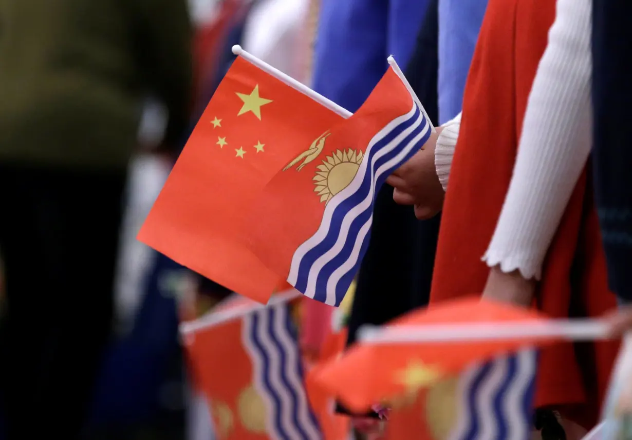 China's President Xi Jinping and Kiribati's President Taneti Maamau meet in Beijing