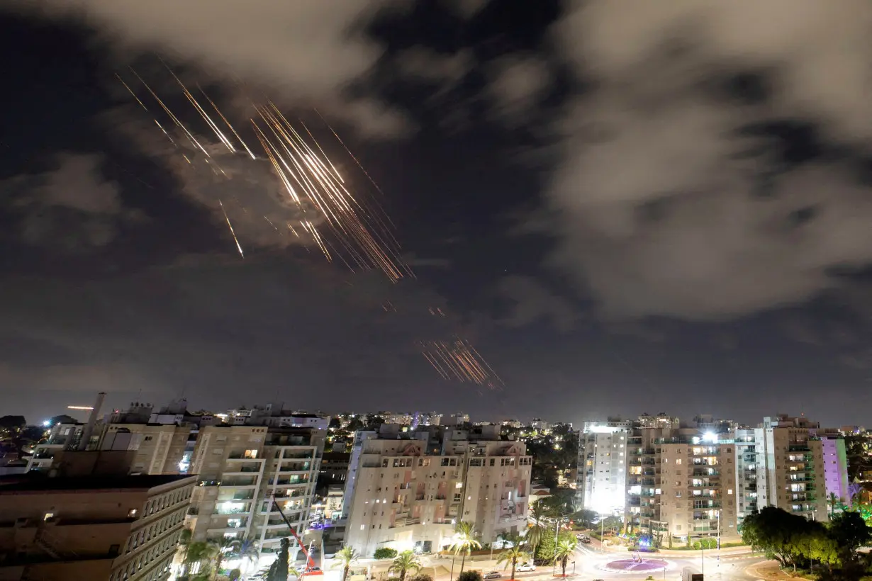 FILE PHOTO: Israel's Iron Dome anti-missile system intercepts rockets, as seen from Ashkelon