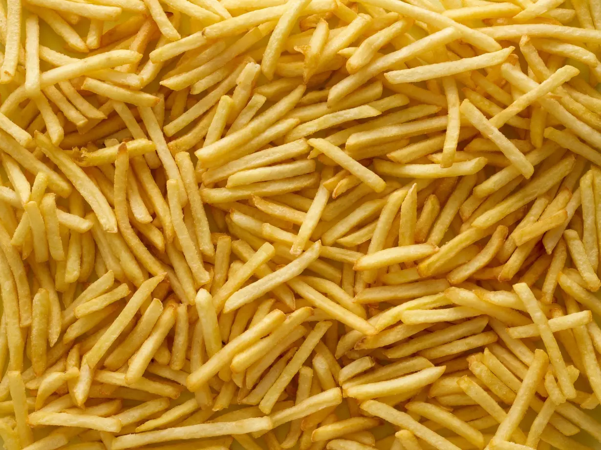 McDonald's customers are cutting back on fries. Its biggest supplier is cutting jobs