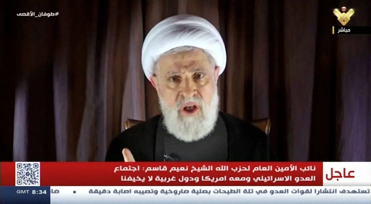 Lebanon's Hezbollah deputy leader Sheikh Naim Qassem delivers a speech as hostilities between Hezbollah and Israel increase, from an unknown location on October 8.