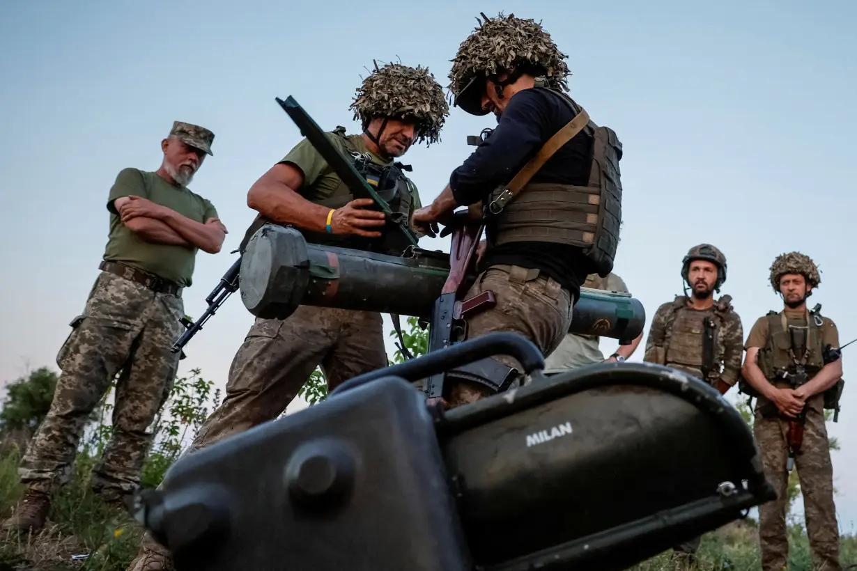 FILE PHOTO: Ukrainian service members attend military drills near a frontline in Donetsk region