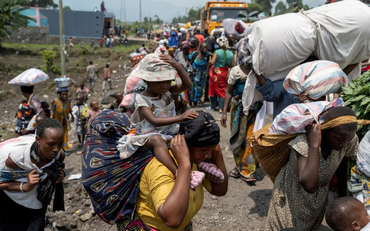 FILE PHOTO: Thousands more flee rebel advance in eastern Congo