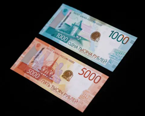 Russian rouble hits one-year lows against major currencies