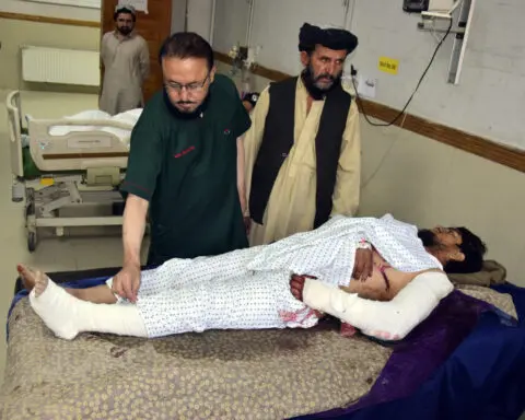 Gunmen kill 21 miners in southwest Pakistan ahead of an Asian security summit