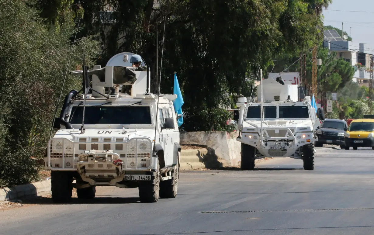 UN peacekeepers (UNIFIL) vehicles are seen parked in Marjayoun