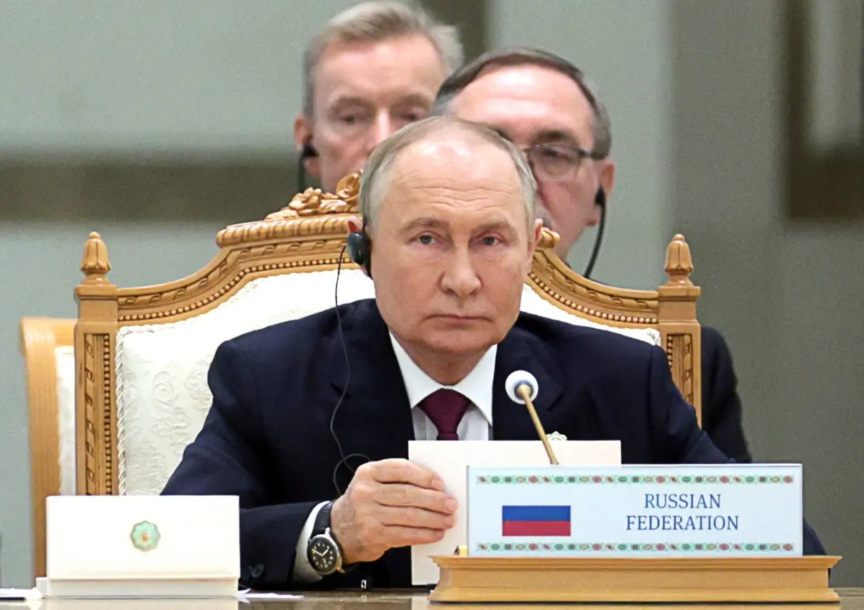 Russian President Vladimir Putin attends a cultural forum in Ashgabat