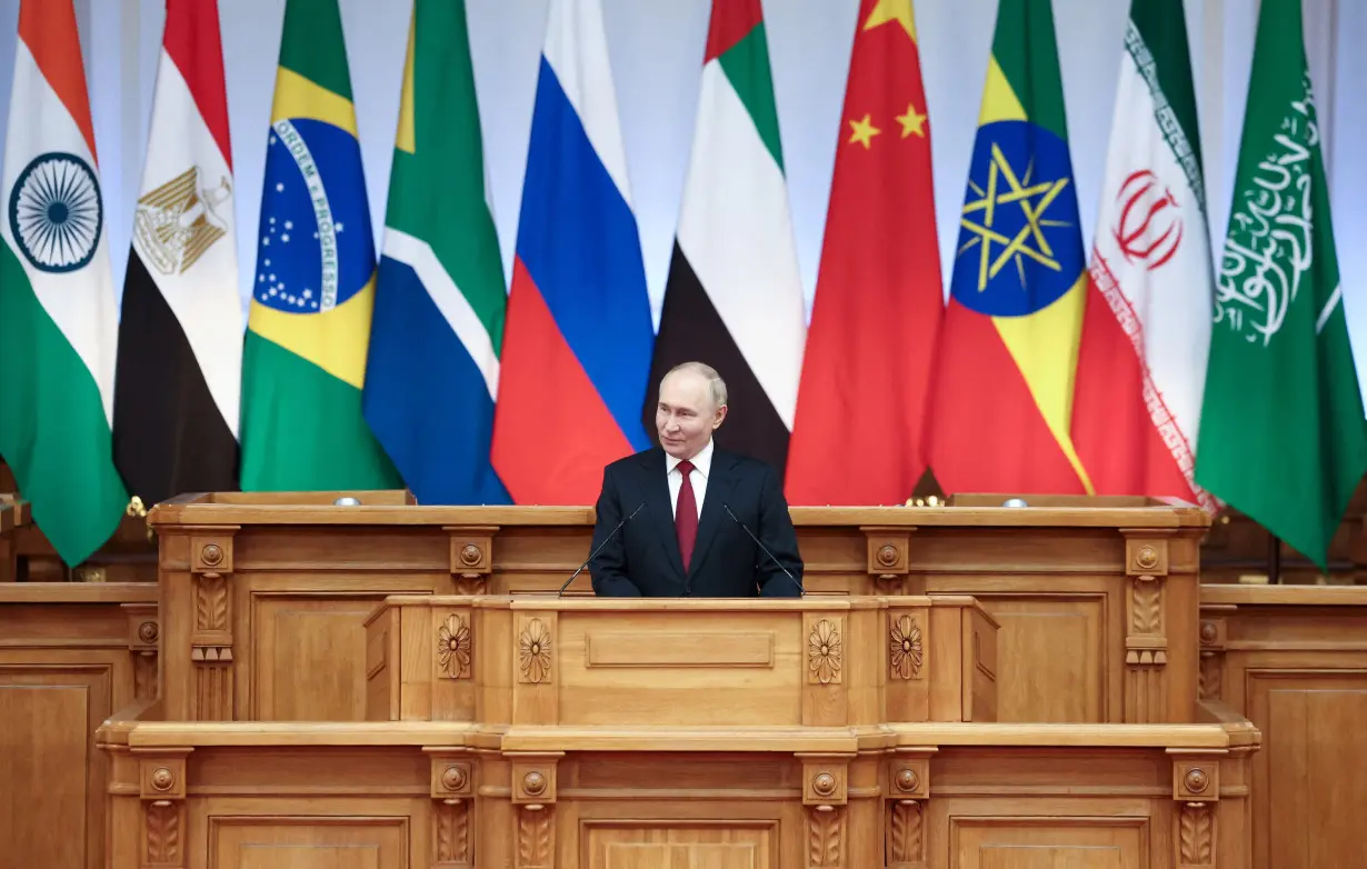 FILE PHOTO: Russian President Vladimir Putin speaks at the BRICS Parliamentary Forum in Saint Petersburg