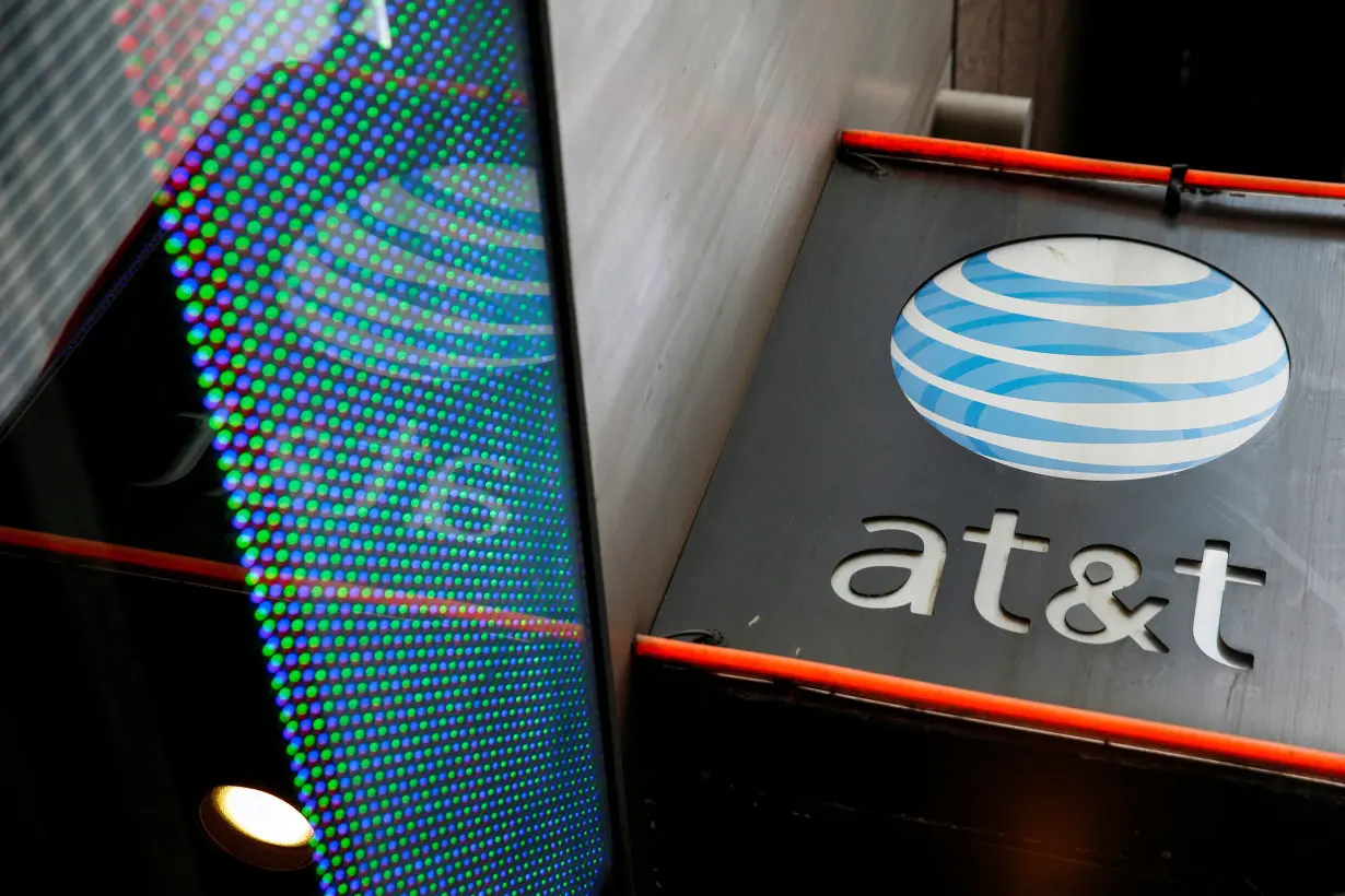 FILE PHOTO: The signage for an AT&T store is seen in New York