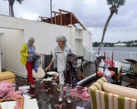 Florida resident in tears talking about her destroyed house