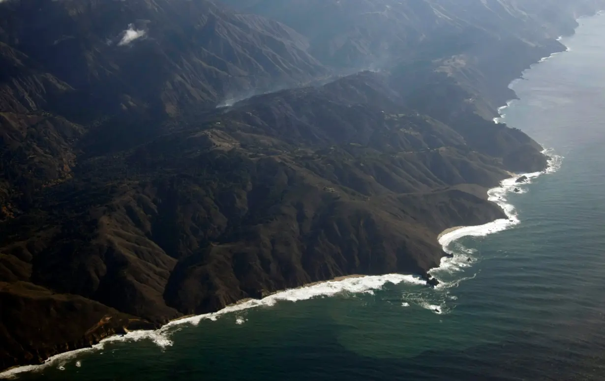 Aerial view shows smoke rising from a wildfire in Big Sur