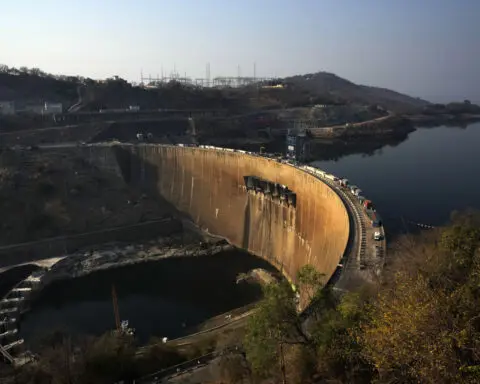Drought is parching the world's largest man-made lake, stripping Zambia of its electricity