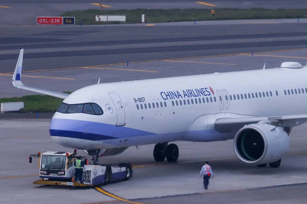 FILE PHOTO: A China airline flight is seen at Taiwan Taoyuan International Airport in Taoyuan,