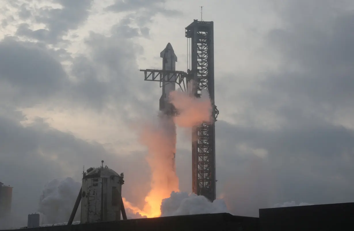 FILE PHOTO: SpaceX's next-generation Starship spacecraft atop its powerful Super Heavy rocket is launched