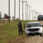 Walz tramps through tall grass on Minnesota's pheasant hunting season opener but bags no birds