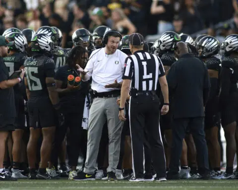 Ejection of Oregon's Traeshon Holden is third this season in FBS for a player spitting on opponent