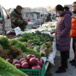 China's deflationary pressures build in Sept, consumer inflation cools