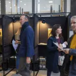 Lithuanians vote in parliamentary election with many looking for change despite a strong economy