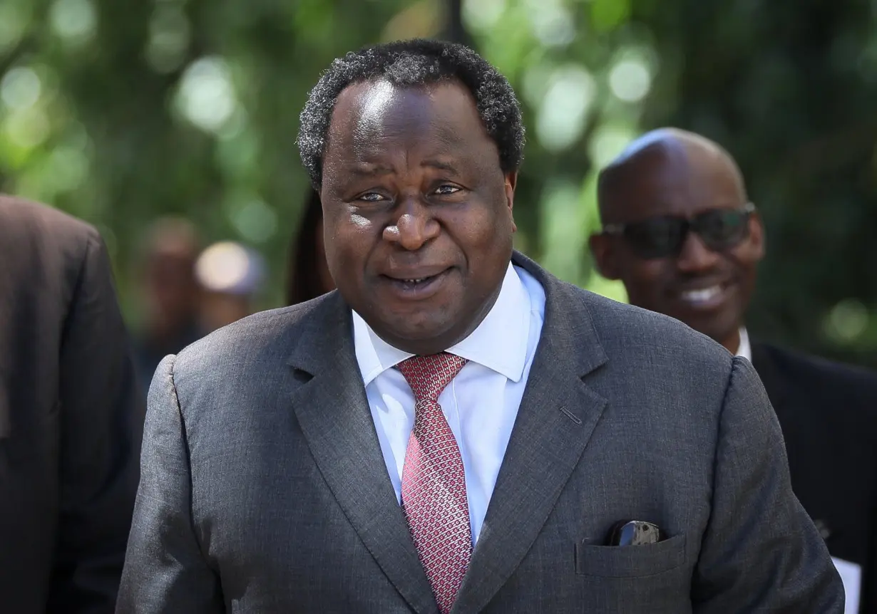 South African Finance Minister Tito Mboweni reacts as he arrives to deliver his budget speech at the parliament in Cape Town