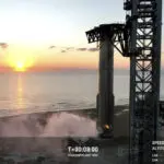 In an engineering feat, mechanical SpaceX arms catch Starship rocket booster back at the launch pad