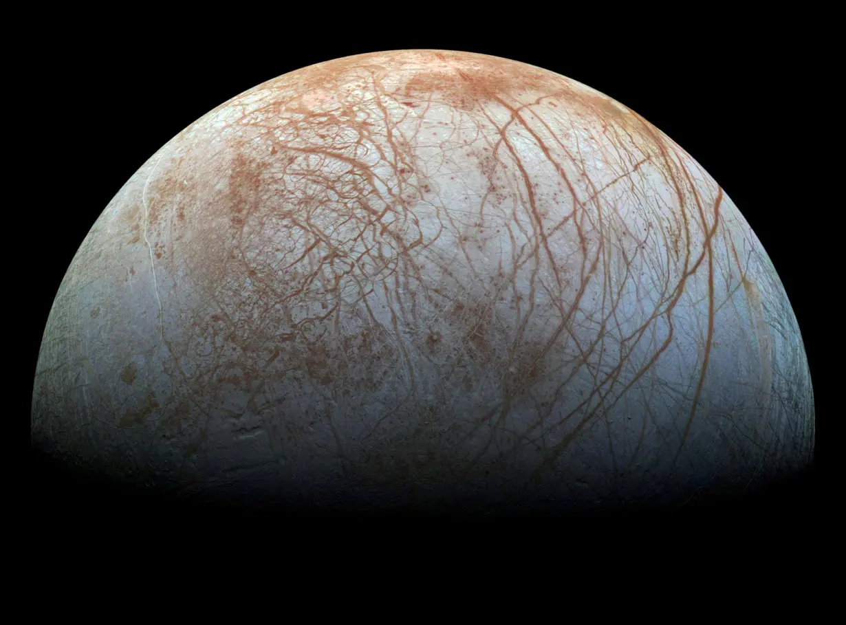 FILE PHOTO: Handout photo of a view of Jupiter's moon Europa, created from images taken by NASA's Galileo spacecraft in the late 1990's