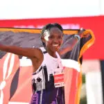 Athletics-Kenya's Chepngetich smashes women's marathon world record