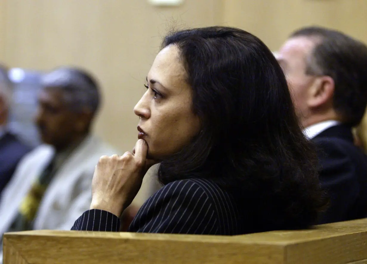 In this 2004 photo, then-District Attorney Kamala Harris waits for a proceeding to convene in San Francisco.